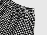 Wide-fit gingham trousers - ucb_image_DS1