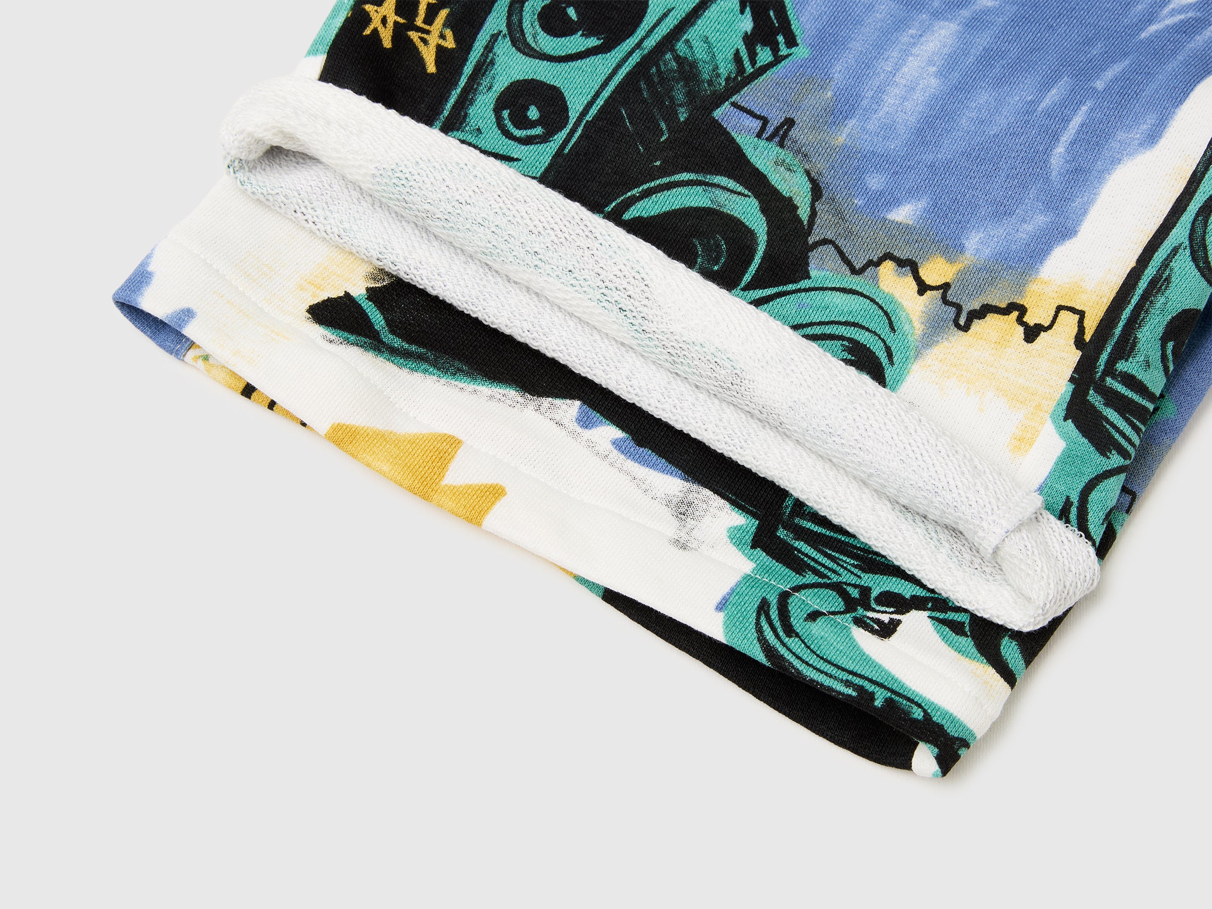 Over-fit Bermuda shorts in printed fleece - ucb_image_DS1