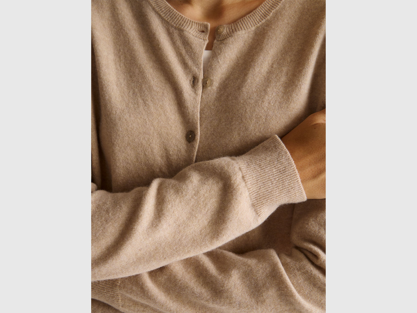 Beige crew neck cardigan in pure Merino wool
