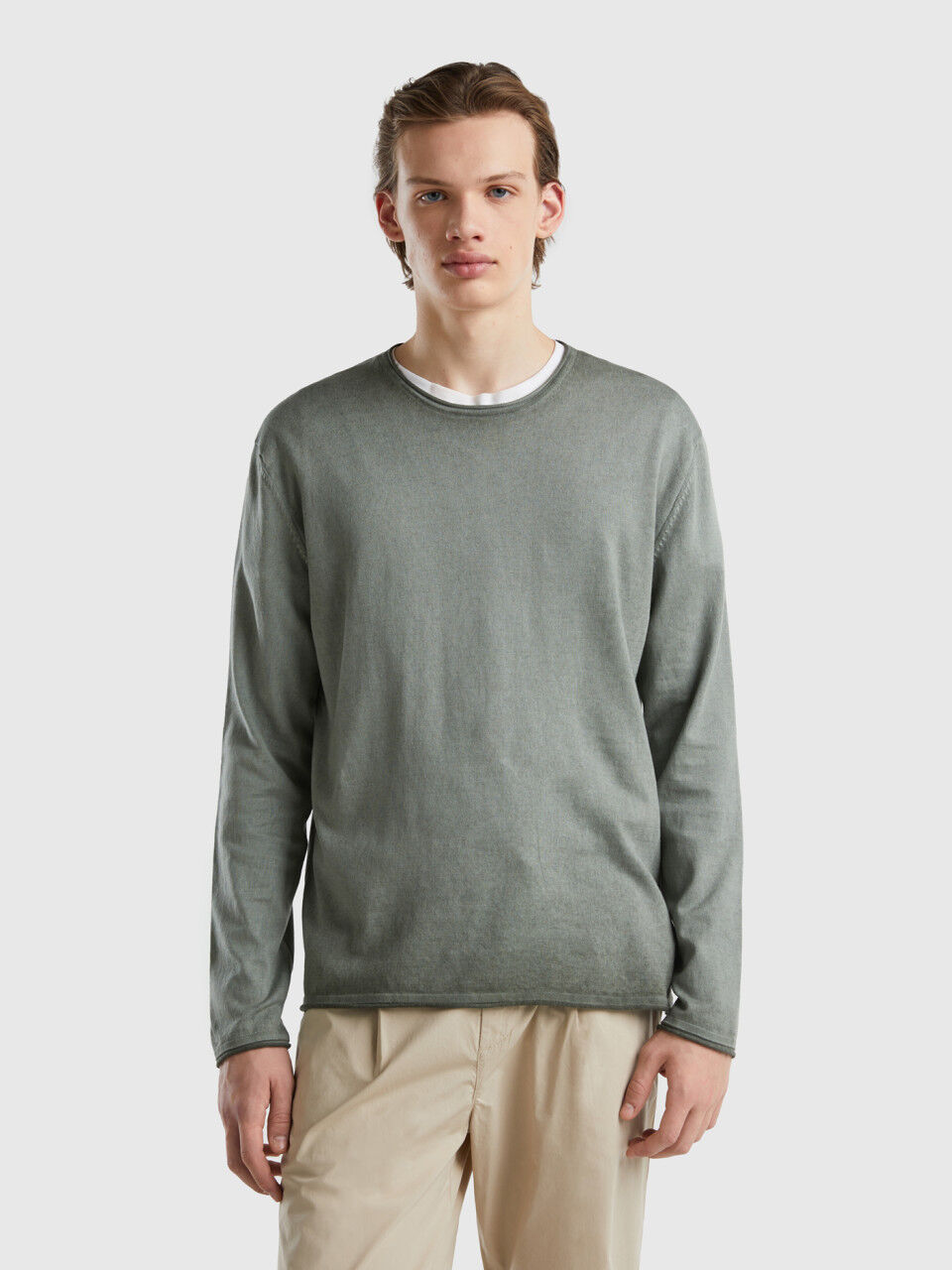Sweater with raw cut finish