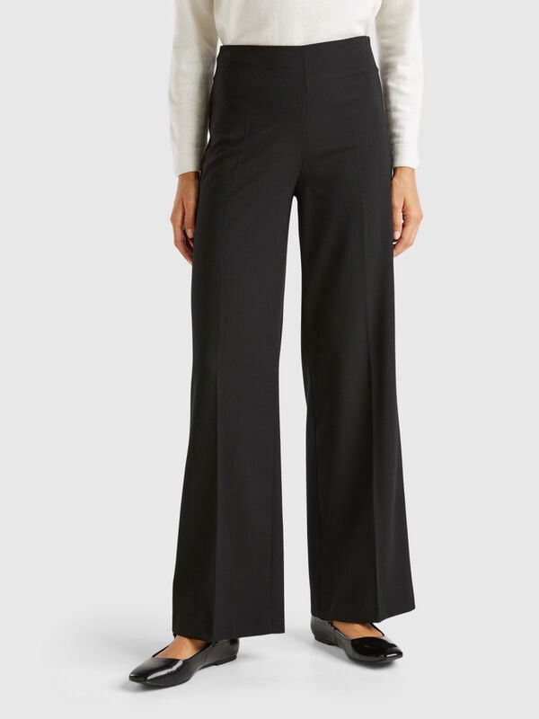 Flowy high-waisted trousers Women