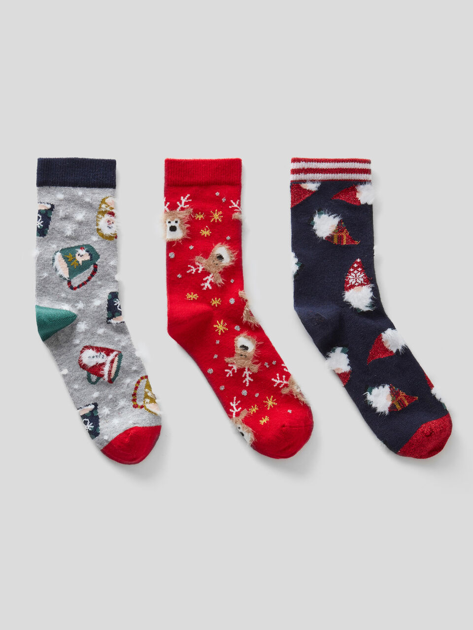 Three pairs of Christmas-style socks image number 1