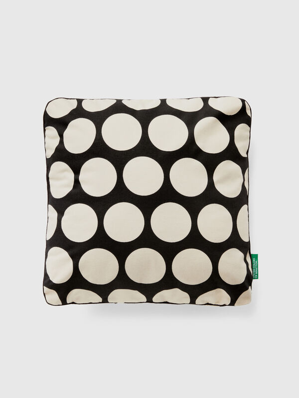 Square pillow with white polka dots