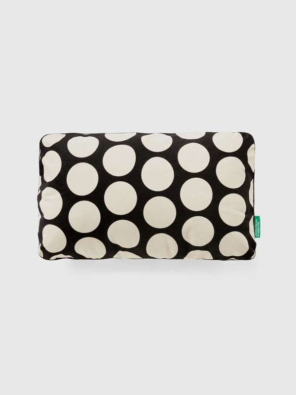 Rectangular pillow with white polka dots