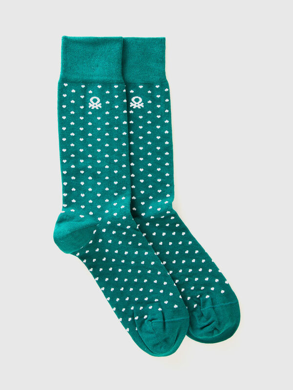 Long socks with green hearts