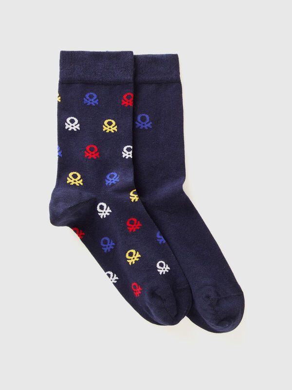 Two pairs of long socks with logos