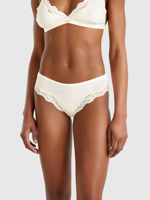 Slip haut côtés avec empiècements en dentelle Femme