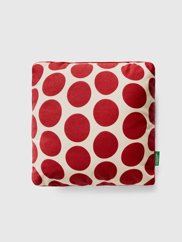 Square pillow with red polka dots