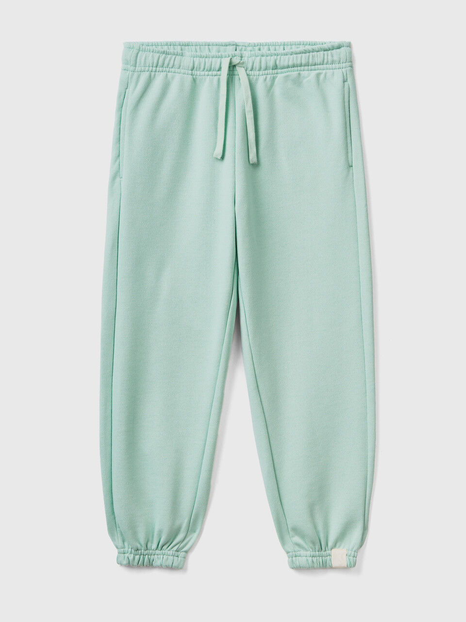 Joggers in recycled fabric with drawstring