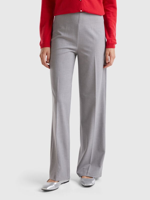 Flowy high-waisted trousers Women