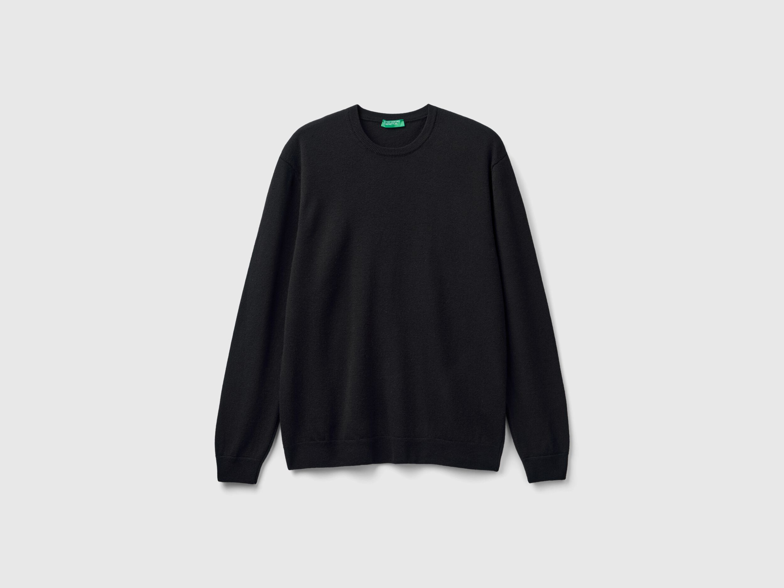 Black crew neck sweater in pure Merino wool Black Benetton