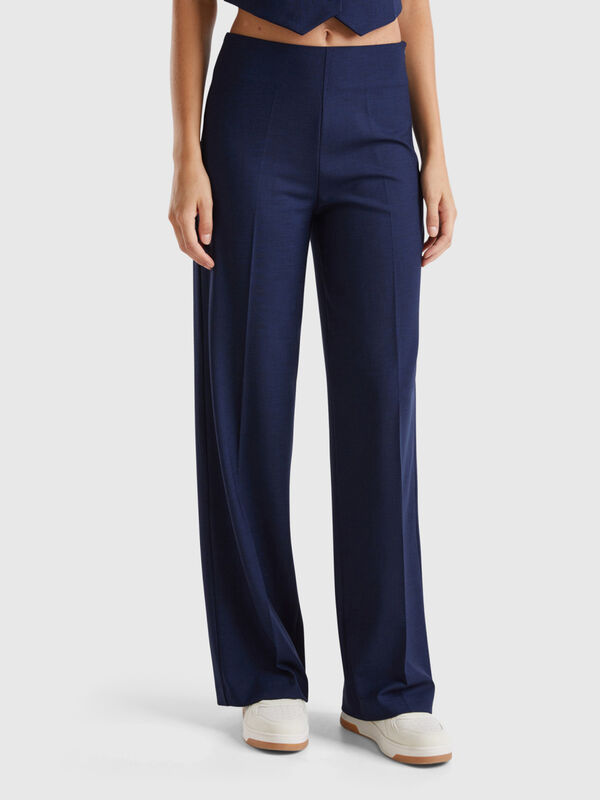 Flowy high-waisted trousers Women